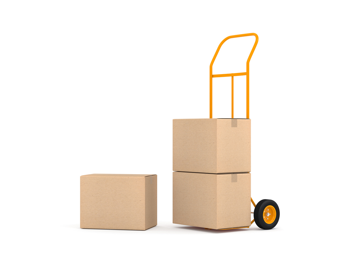 Hand Truck and three brown cardboard boxes on white background